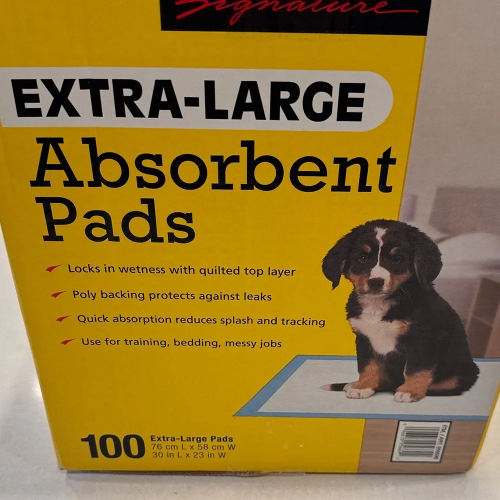 Kirkland Signature Extra-Large Absorbent Pads only a couple pads missing 1 pack.